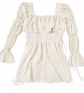 Ruffle Dress ( it has a tie in the back)