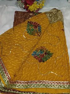 Embellished Brown Net Saree with blouse