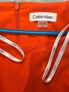 Calvin Klein Orange Jumpsuit Brand new