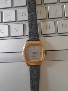 Vintage Gold Tone Watch with Black Leather Strap