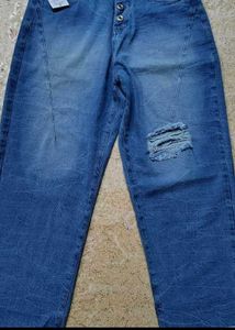 Distressed Blue Denim Jeans