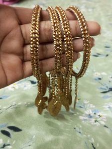 Elegant Gold-Toned Bangle Set with Leaf Charms