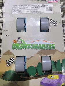 Two toys - Buggy and Racing car to