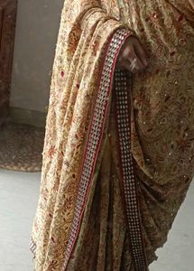 pure Georgette yellowish golden Saree
