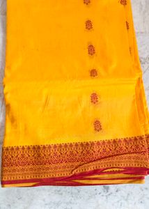 Vibrant Yellow Saree with Red Border
