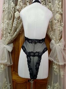 Lace Trimmed Black Bodysuit
