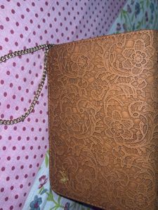 Elegant Embossed Clutch and sling bag