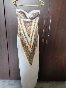 Cleopatra off-shoulder dress.