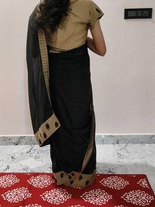 Elegant Black Saree with Gold Border
