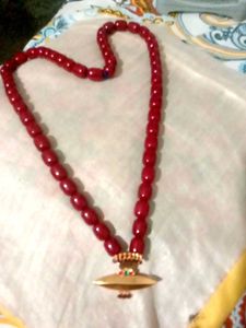 Red Beaded Necklace with Gold Pendant