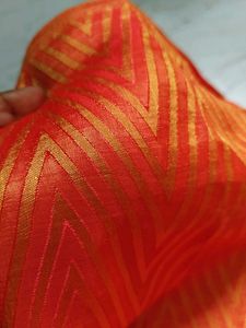 Vibrant Orange Geometric Print Saree
