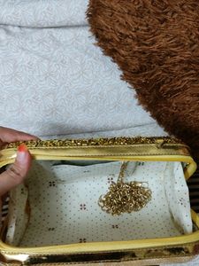 Price Dropped Golden Clutch Without Chain .