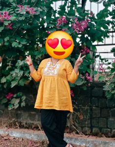 Yellow printed crop top and korian paint combo