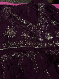 brand new Embellished gown with falling sleeves