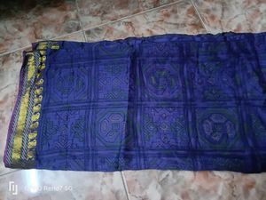 Vibrant Blue Saree with Intricate Pattern