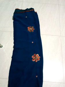 Beautiful Teal Saree with Embellished Blouse