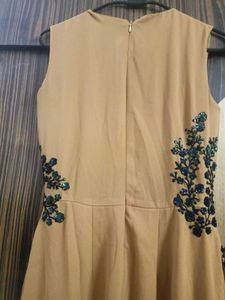 Elegant Beige Jumpsuit with Embellishments