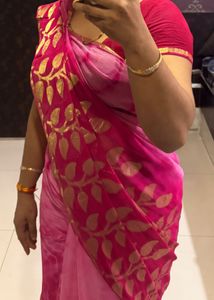 Elegant Pink Saree with Golden Motifs