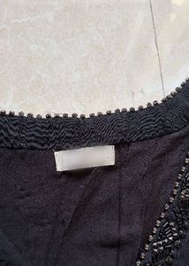 Chic Black Beaded Ruffle Top