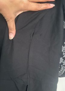 Elegant Black Kurta with Intricate Sleeve Embroide