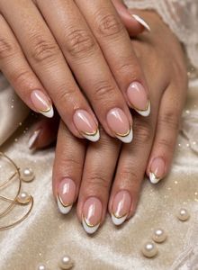 Elegant French Manicure with Gold Accent