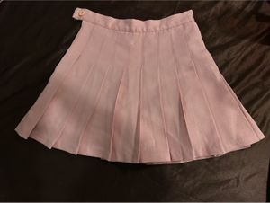 baby pink tennis skirt with pleats