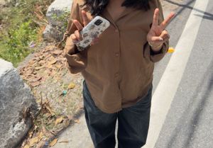 brown baggy shirt