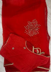 Elegant Red Saree with Gold Embellishments