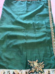 Elegant Green Saree with Floral Border