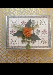 9. Decorative Gift Box with Floral Accent