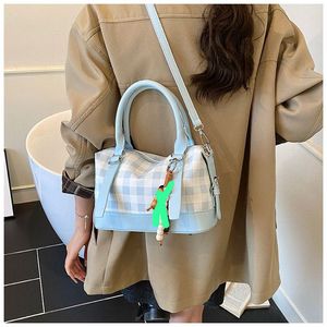 Chic Pink Plaid Handbag with Charm