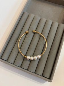 Elegant Pearl &amp; Gold Tone Cuff Bracelet