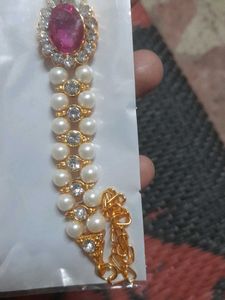 Elegant Pearl and Ruby Bajuband