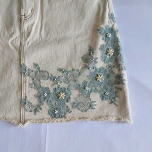 Cream Denim Skirt with Blue Floral Applique