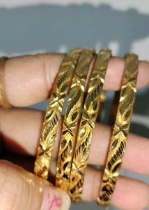 brand new Set of 4 Elegant Gold Bangles