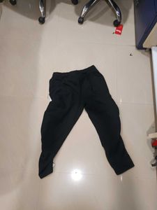 Comfortable Black Pants with white strips on the s