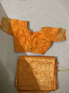 Elegant Orange Saree with Golden Border