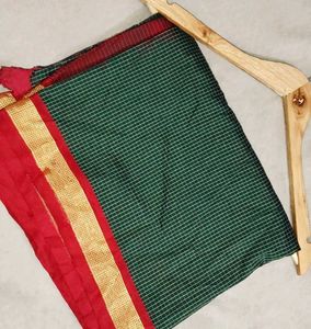 Elegant Green Saree with Red Border
