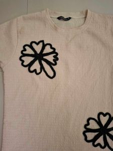 Cream Textured Top with Black Flower Applique