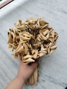 handmade rose bouquet with dried leaves