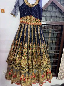 long heavy tail cut dress with intricate embroider