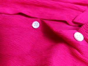 pink botton-up shirt