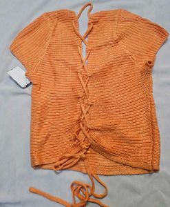 Orange knitted cropped top