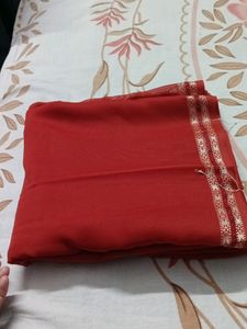 Red-orange(rust) Georgette Saree With Thin Border