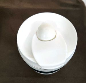 Stylish White Travel Mug with Black Grip
