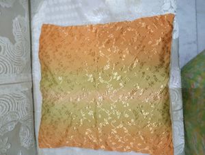 A set of two cushion covers