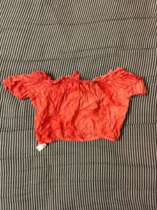 Coral Off-Shoulder Smocked Top