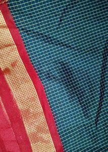 Elegant Green Saree with Red Border