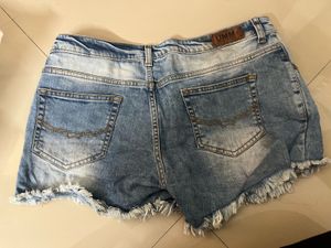 Distressed Light Wash Denim Shorts