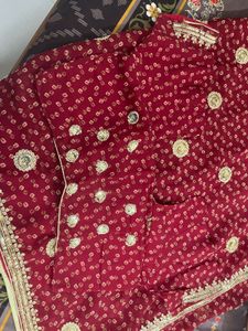 Elegant Maroon Saree with Gold Embroidery